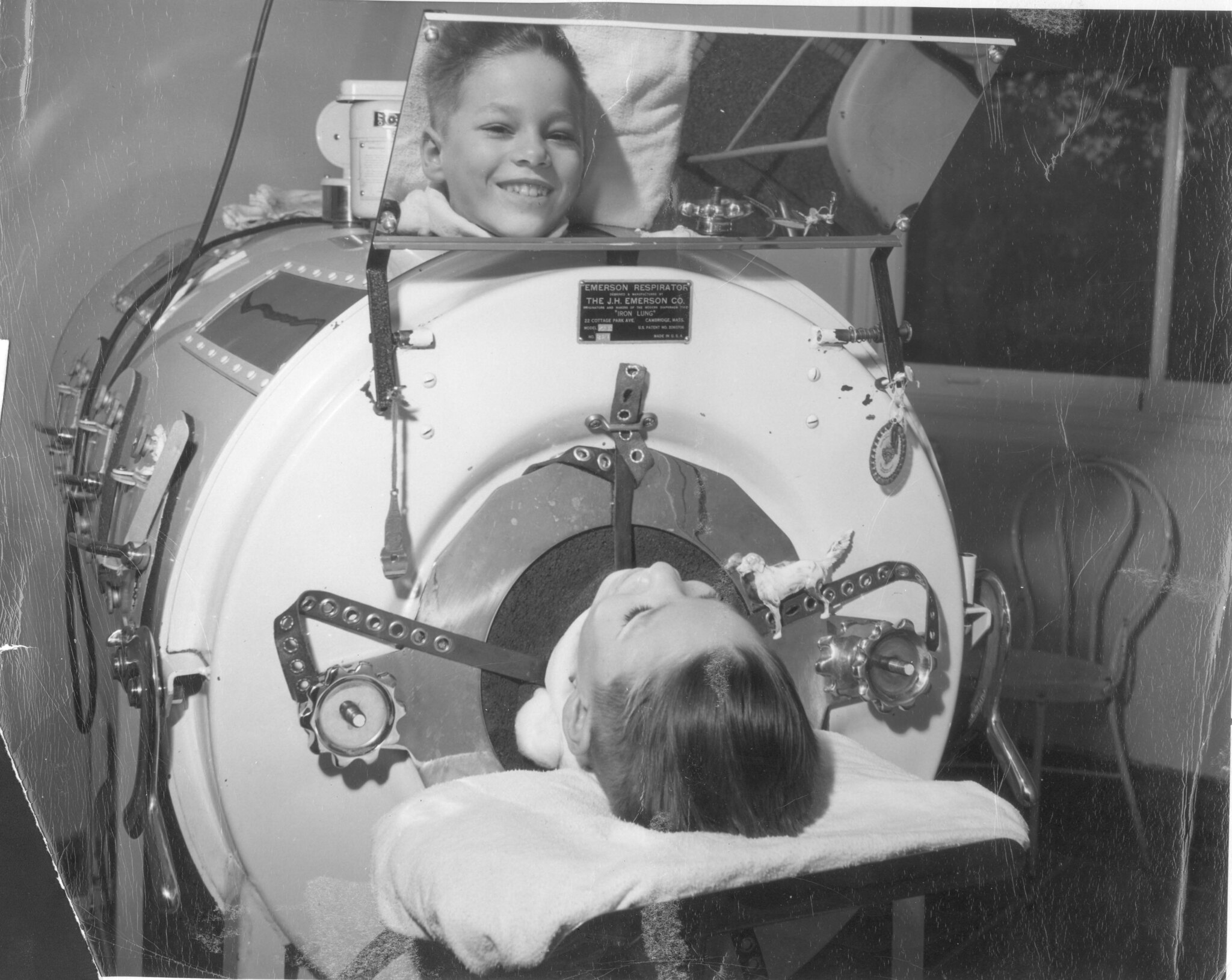 “Boy in Emerson Respirator (Iron Lung)” © Otis Historical Archives National Museum of Health and Medicine; photograph by Joe Clark; Creative Commons license