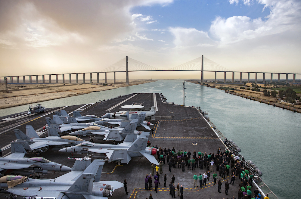 "The USS George H.W. Bush at the Friendship Bridge" © U.S. Navy, photo by Mass Communication Specialist 3rd Class Michael B. Zingaro; Creative Commons license