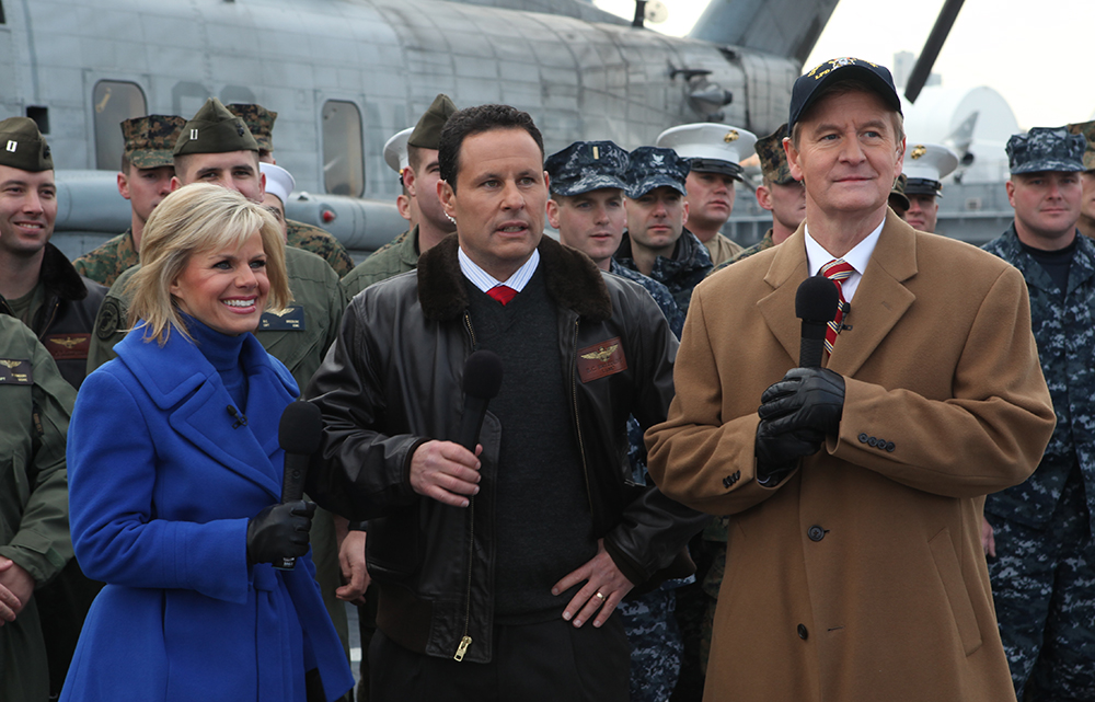 Gretchen Carlson, Bill Kilmeade, and Steve Doocy; United States Marine Corps; public domain