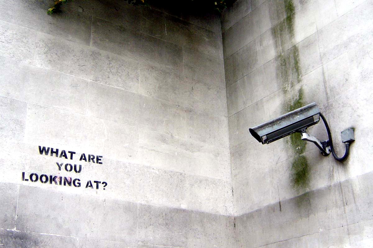 "What Are You Looking At?"—stencil by Banksy © nolifebeforecoffee; Creative Commons license