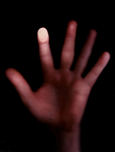 Image of a hand focused on the finger print
