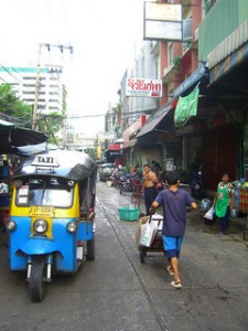 tuk tuk parked out by the market