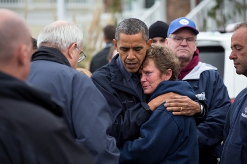President Barack Obama hugs Donna Vanzant as he tours damage from Hurricane Sandy. (Official White House Photo by Pete Souza)