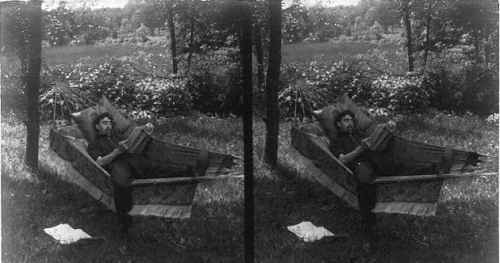 Double image_Young Man Lying in a Hammock "Young Man Lying in a Hammock"stereoscopic image; Library of Congress