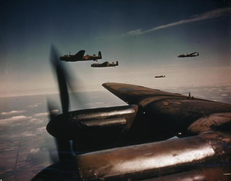 "Avro Lancaster Bombers in Flight, August 26, 1943" © The collections of the Imperial War Museums; Public Domain