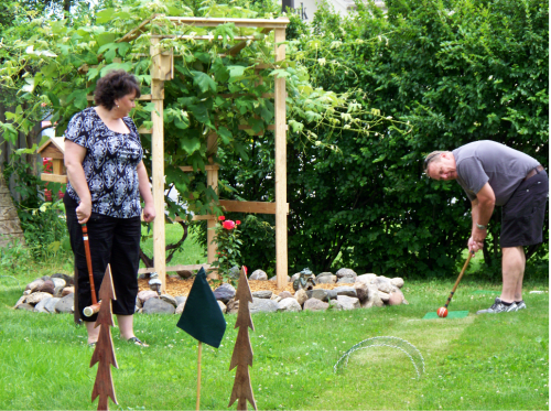 An obstacle course at a family croquet game
